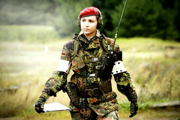 A female soldier in full uniform