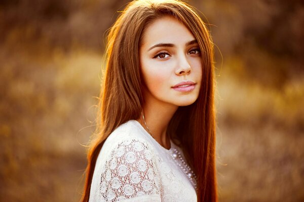 Natural brown-eyed girl photo portrait