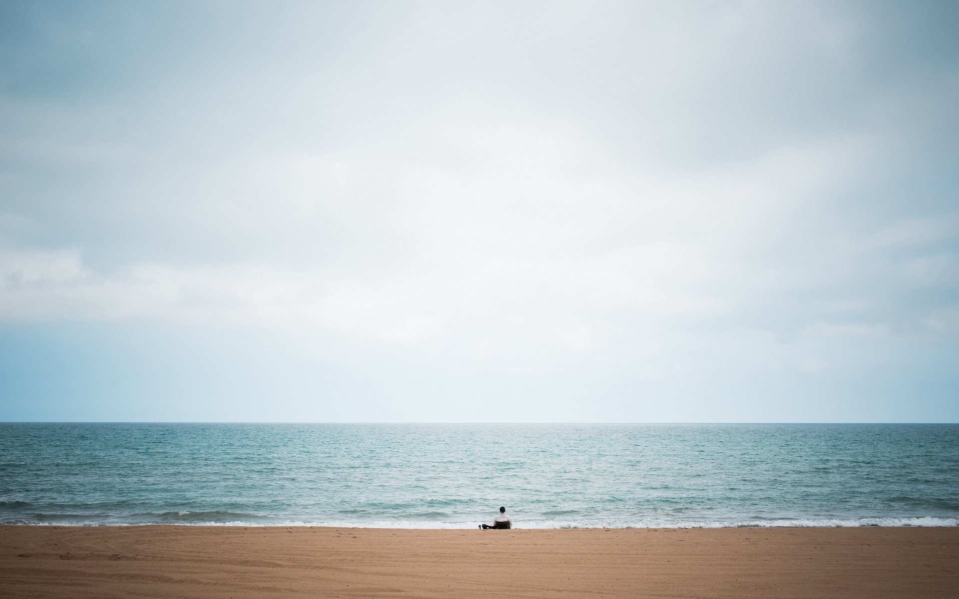 the sky one loneliness lake people large beach blue