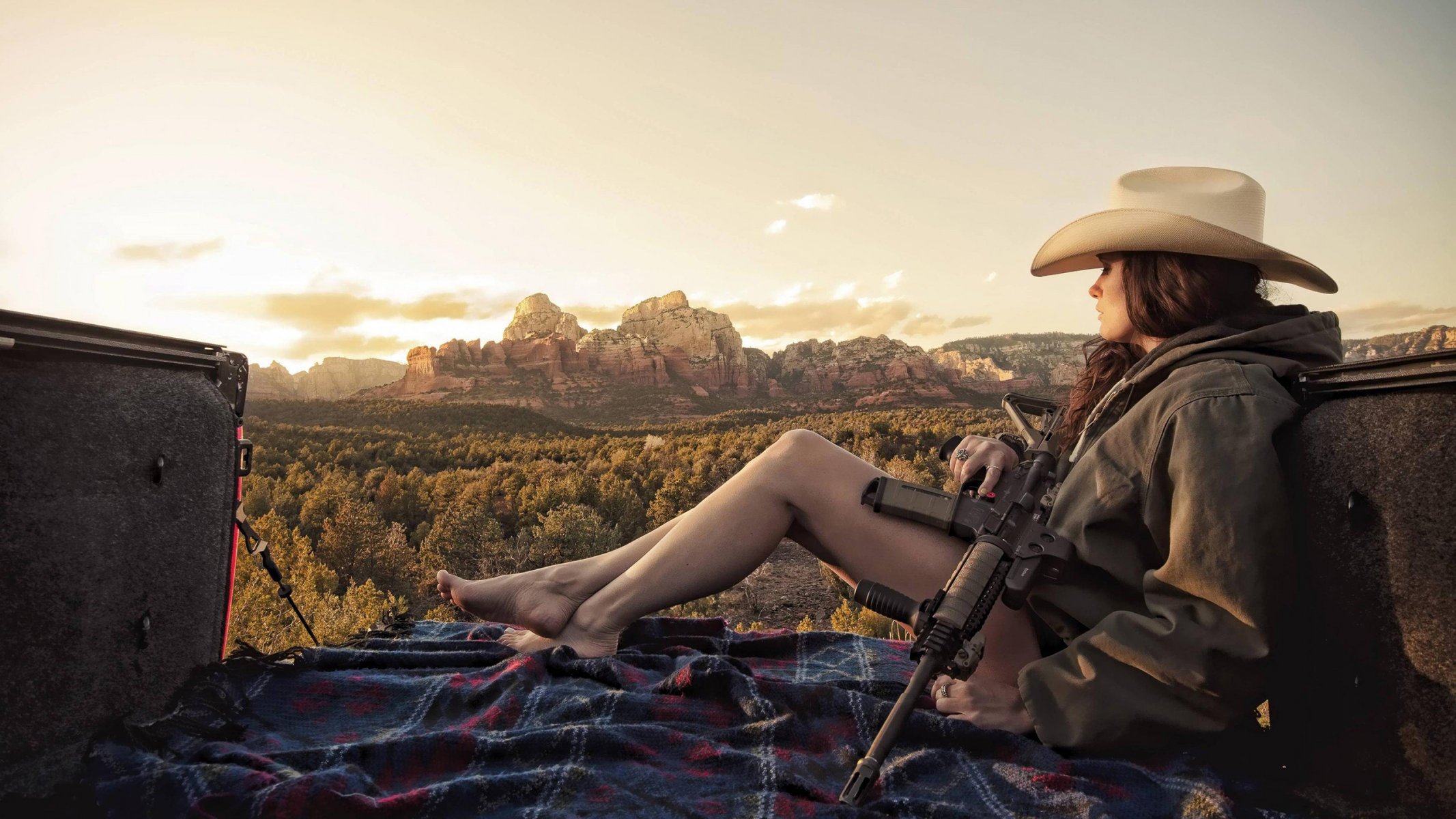 girl brunette machine assault rifle feet hat truck mountain nature