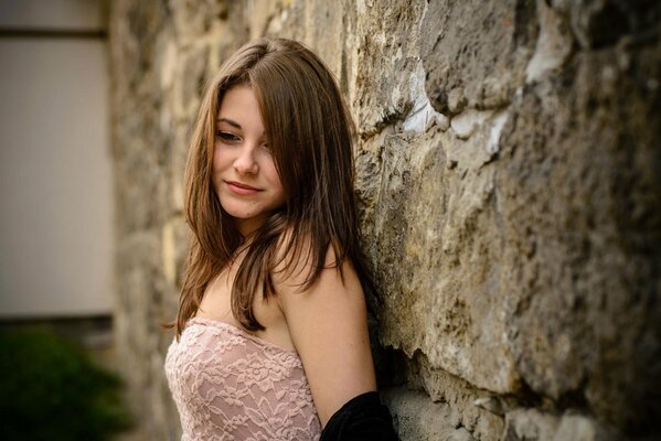 Photo of a girl near the wall