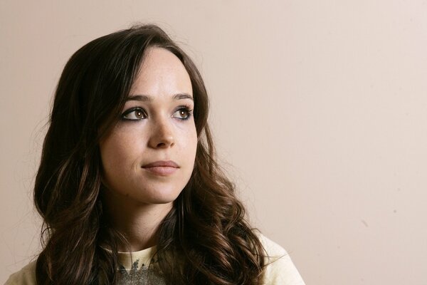 Actress Ellen Page looked away