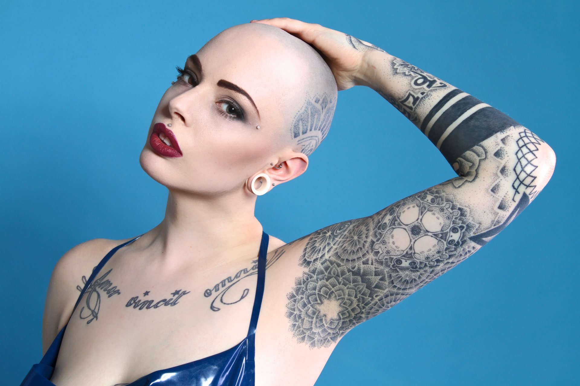 model shaved blue tattoos makeup