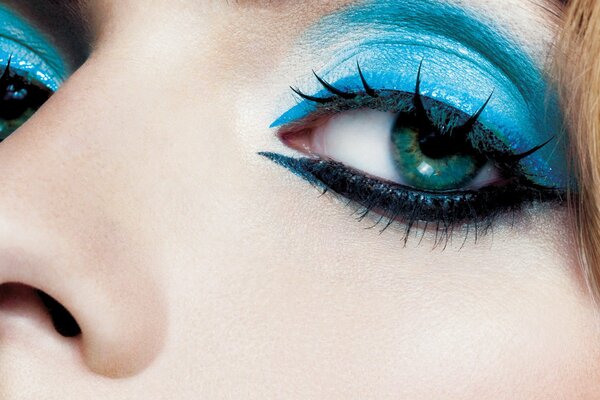 Bright blue eye makeup close-up