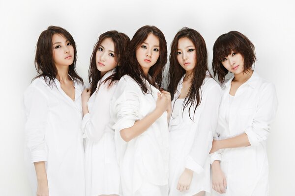 Five Asian women in white shirts