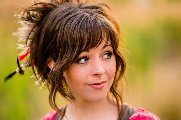 Dark-haired girl on a blurry background