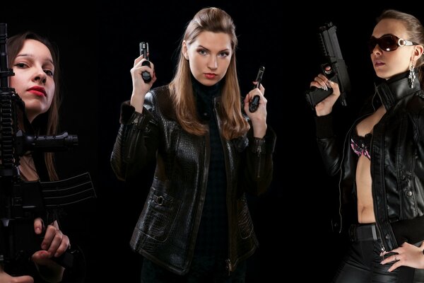 Three girls with guns in black