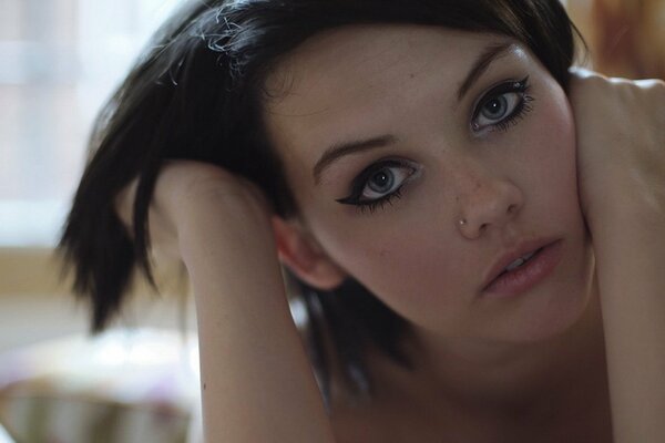 Melissa Clark with a pierced brunette