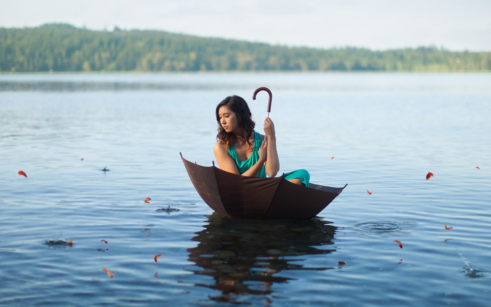 girl lake umbrella fish the situation