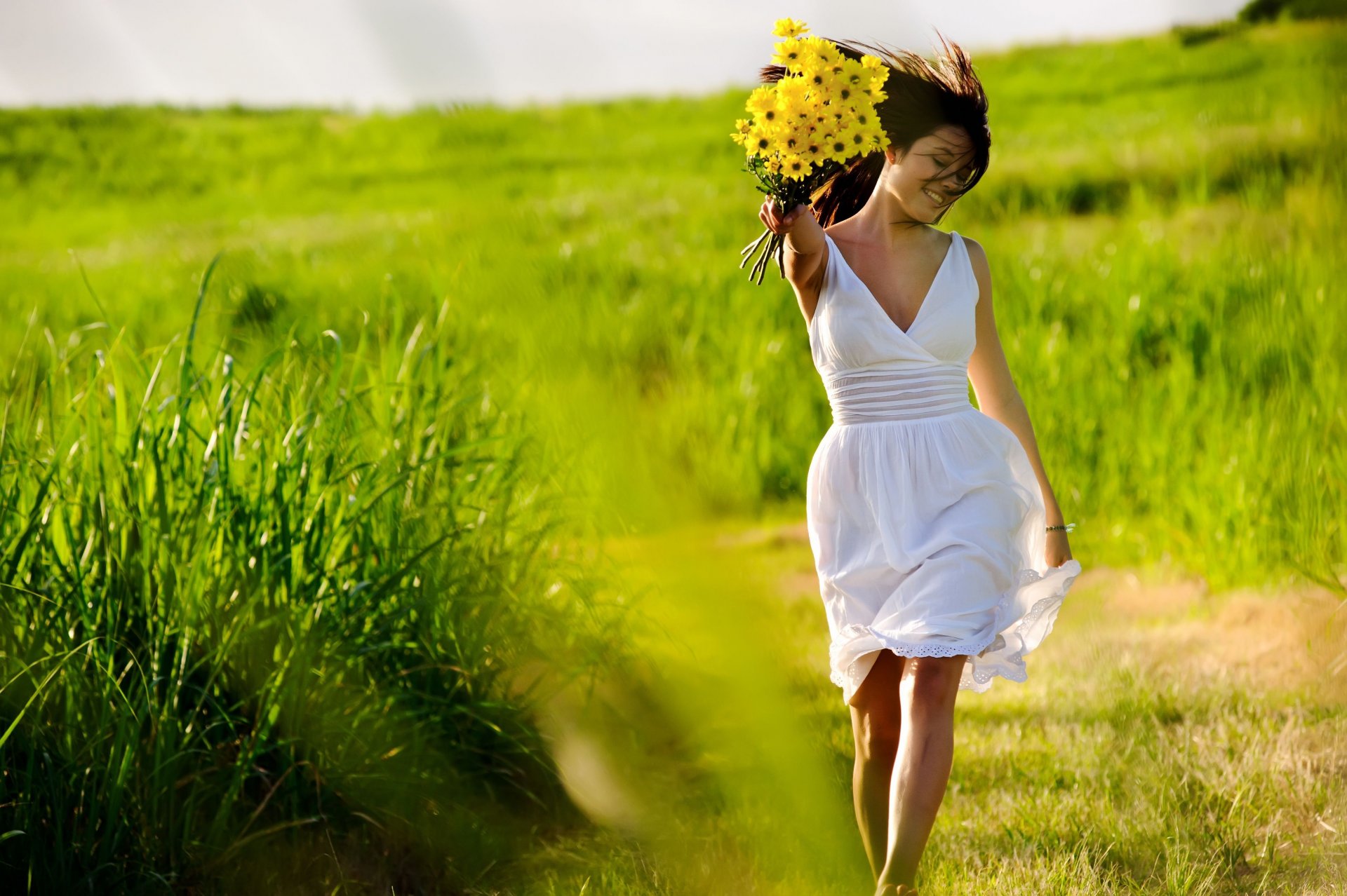 ituations moods girl brunette smile flowers yellow dress freshness joy positive grass greenery nature widescreen. fullscreen wallpaper