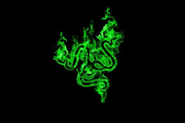 Green monogram pattern on a black background