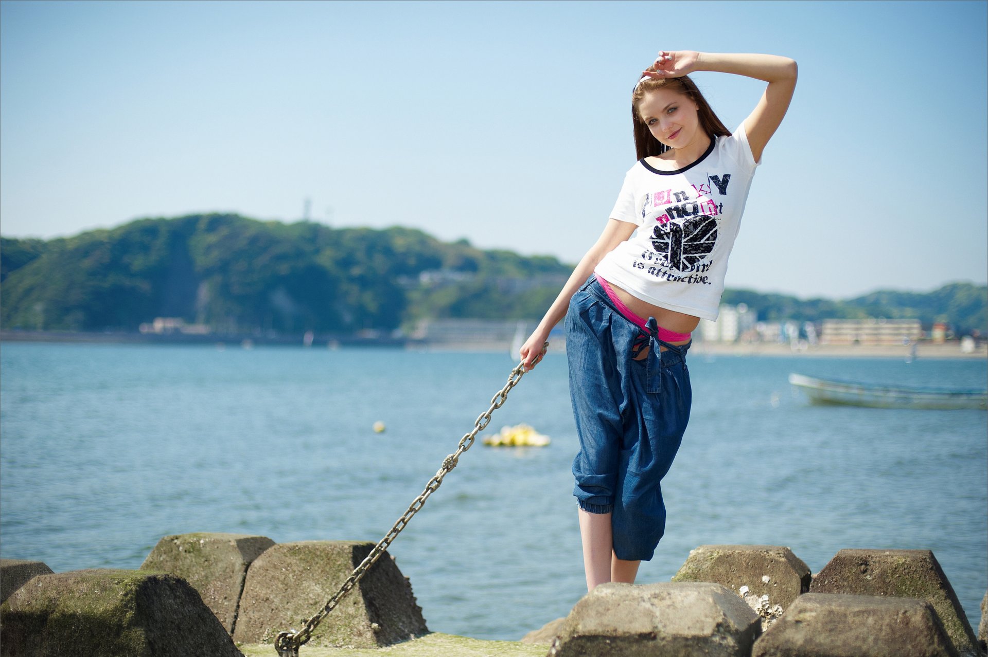 girl brown-haired smile look embankment chain shore river