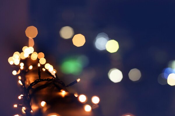 Festive yellow and orange lights from the garland