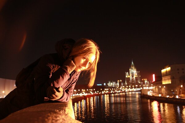 Walk along the embankment in the evening in the city