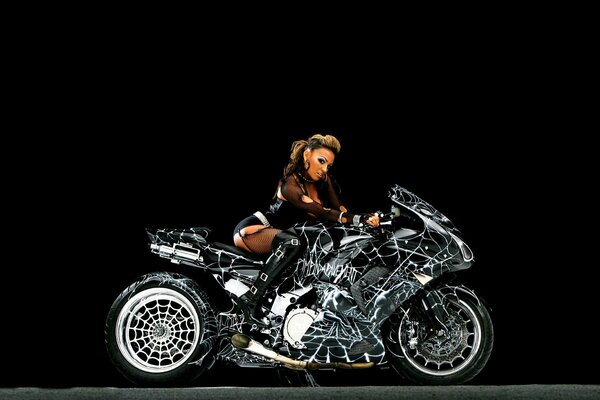 A girl on a motorcycle with tuning