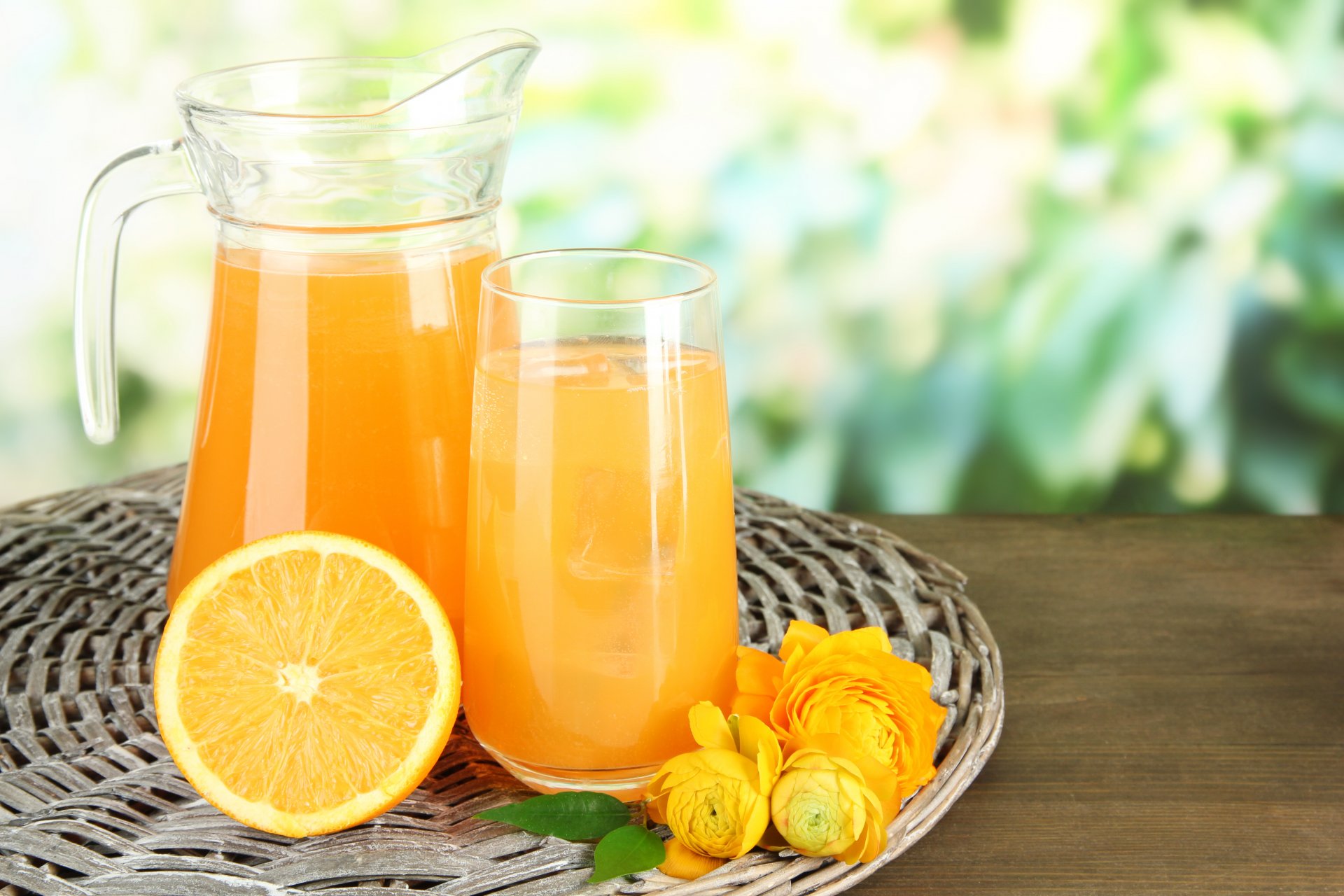 table carafe orange fruit juice flower