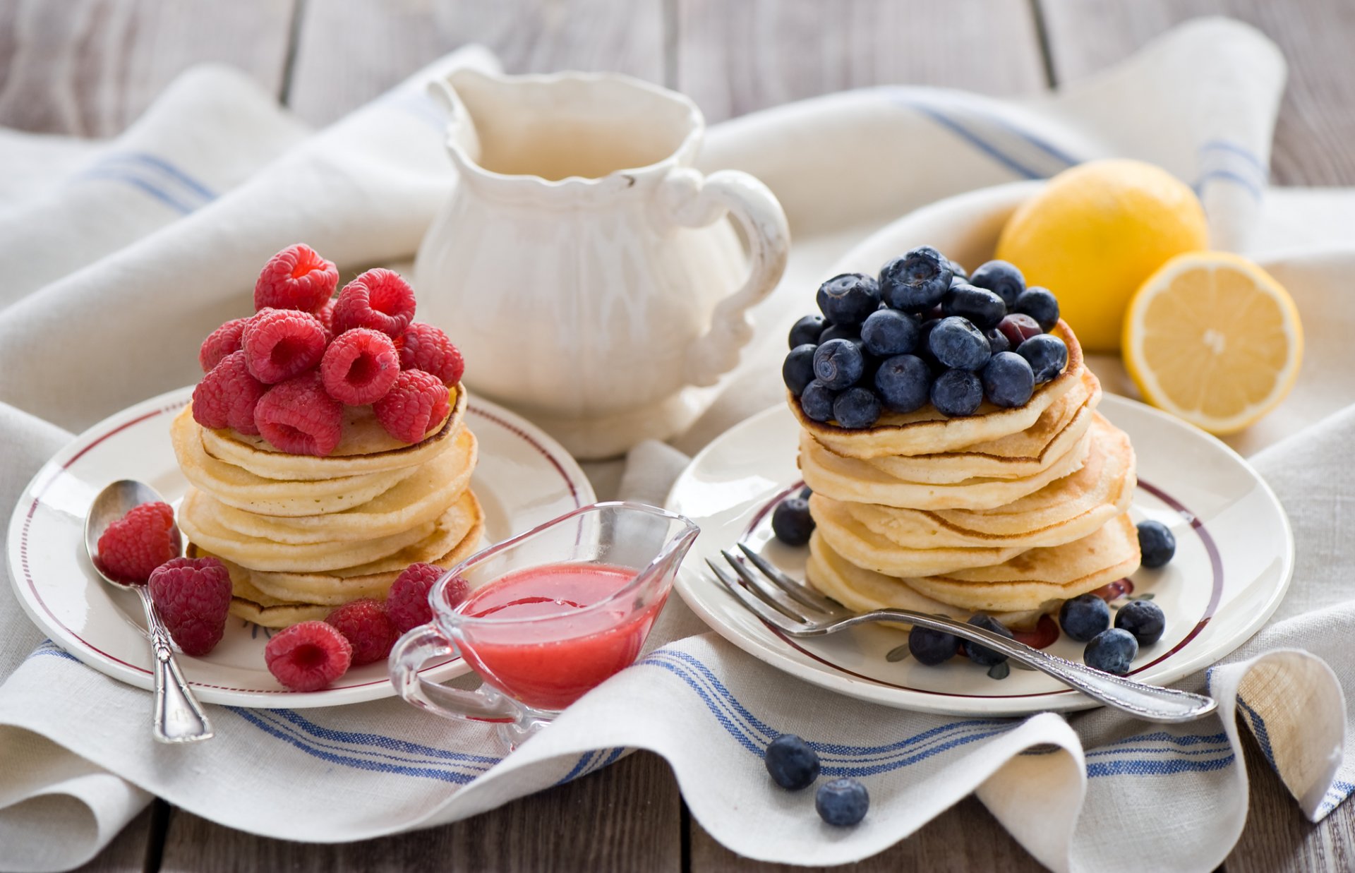 pancakes pancakes berries raspberries blueberries lemons sauce