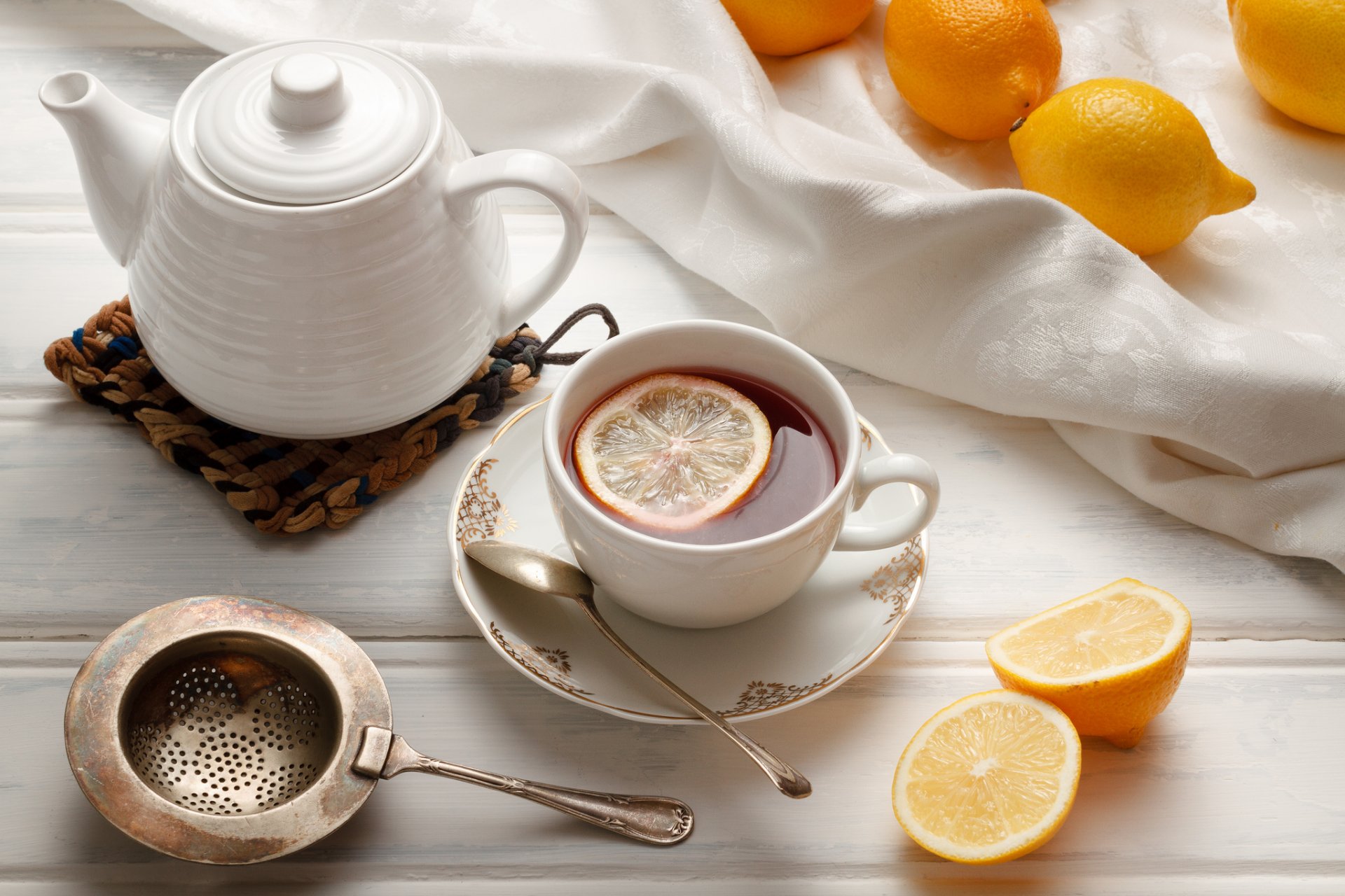 tea cup lemons citrus kettle strainer tableware