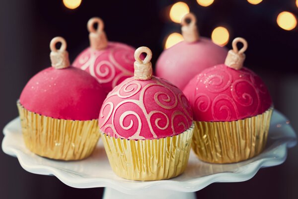 Festive cupcakes in the form of Christmas balls