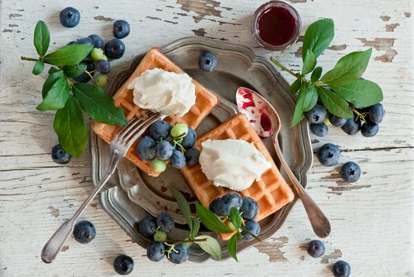 Morning breakfast of waffles with blueberries