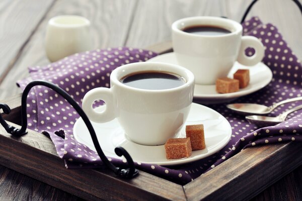 Wooden coffee tray with sugar and toffee