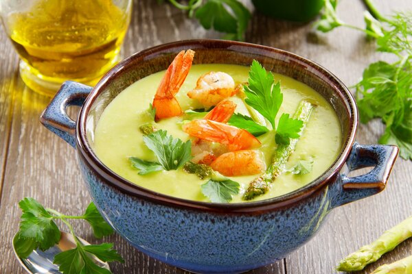 Mashed soup with seafood and herbs