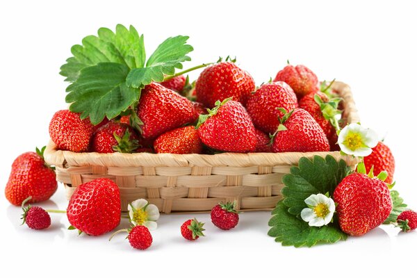 Strawberries in a basket and berries