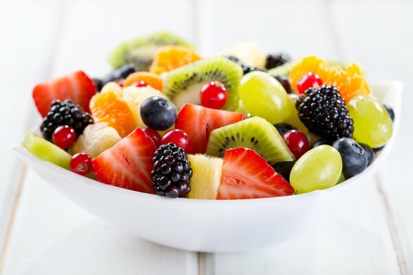 Fruit salad, dessert of berries and fruits