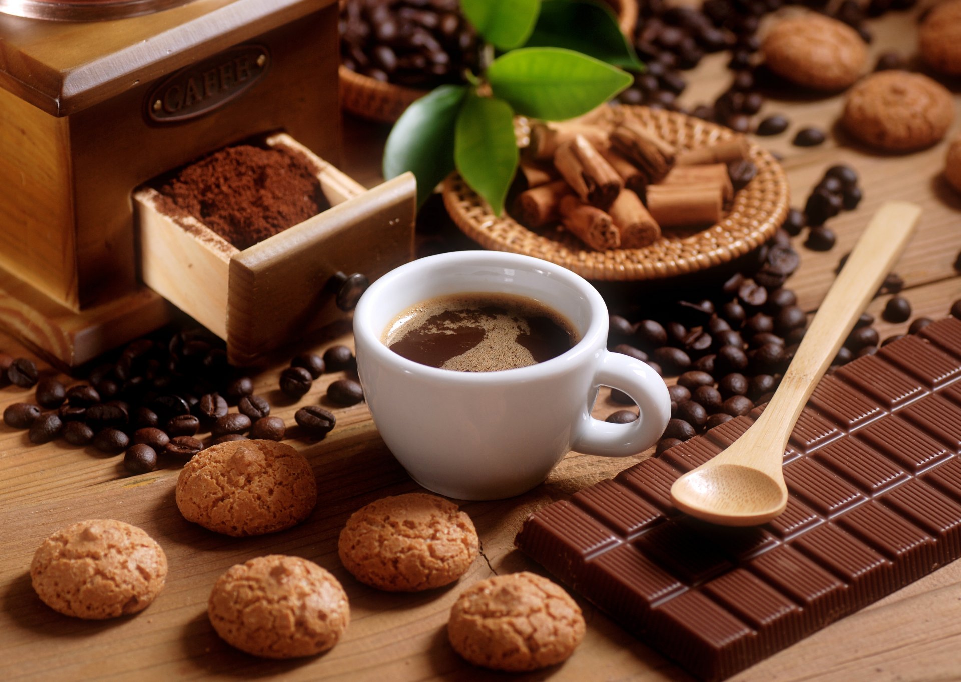 coffee cookies chocolate dairy tile grain cup spoon leaves cinnamon dessert