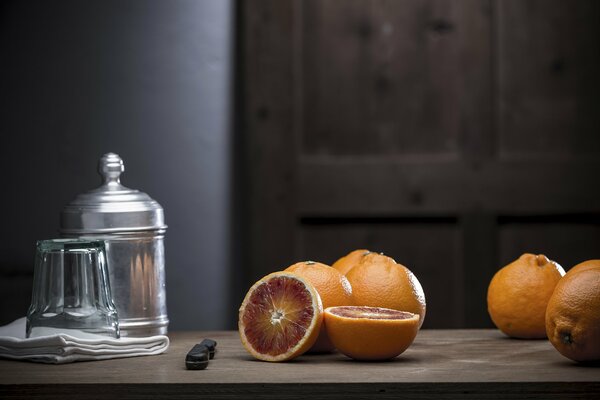 Still life of oranges with the addition of power utensils