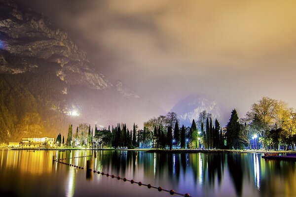 Night landscape of the city with mountains and bay