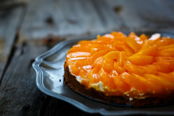 Tarte parfumée aux morceaux de pêche