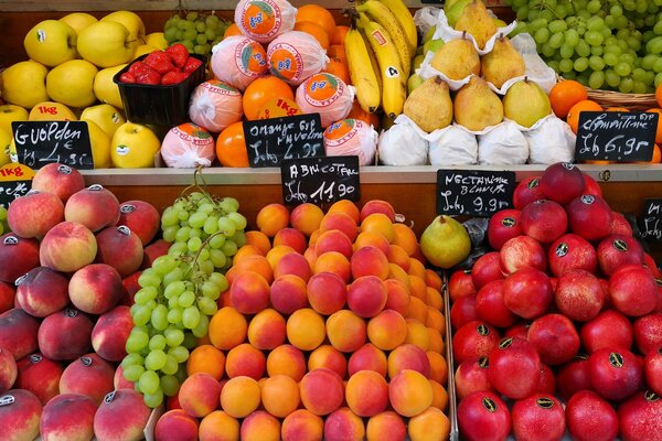Fruits on the shelves. Bright fresh fruits