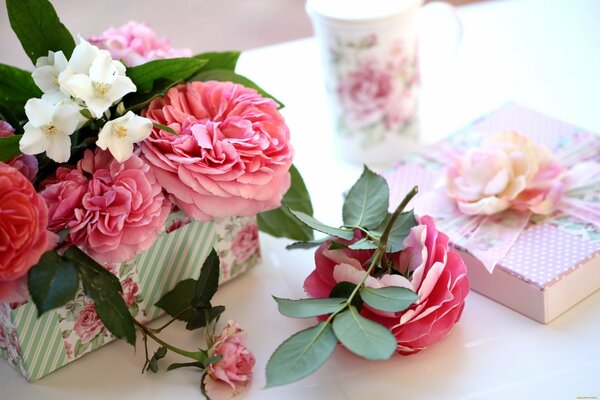 Gift box with roses and jasmine