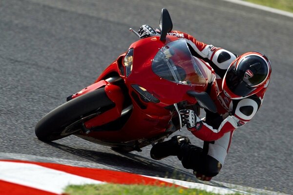Driving sports bike at speed, racer