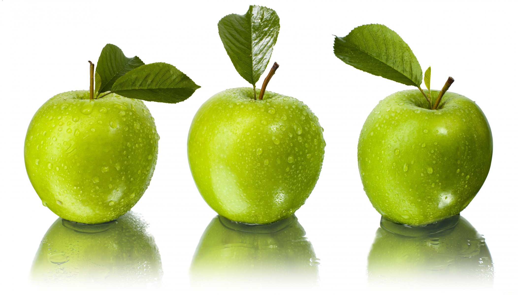 apples drops water leaves reflection white background