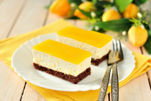 Two cakes with a yellow top