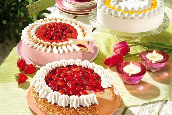 Festive table with strawberry cake