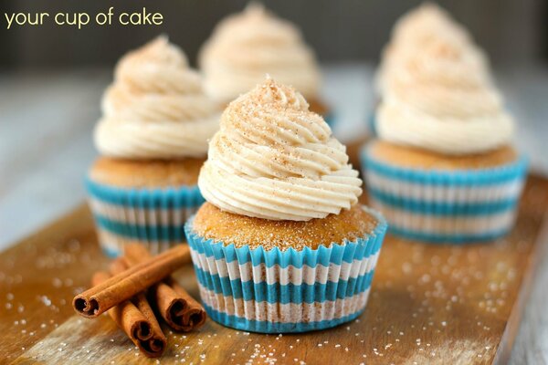 Sweet cakes on a cinnamon board