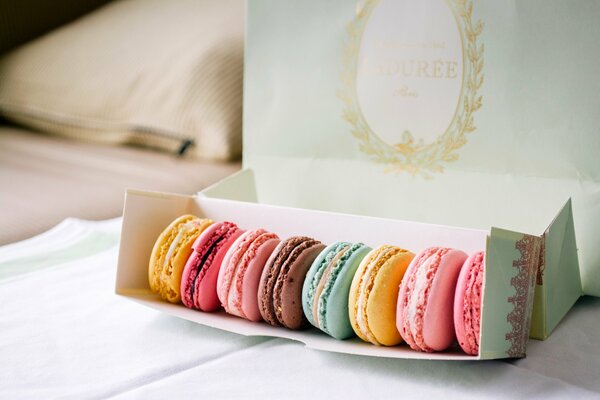 A box of colored macaroons on the table