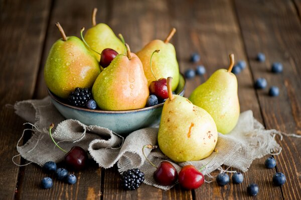 Pears with berries still life