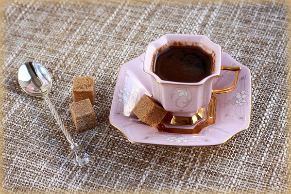 Morning coffee in a pink porcelain cup