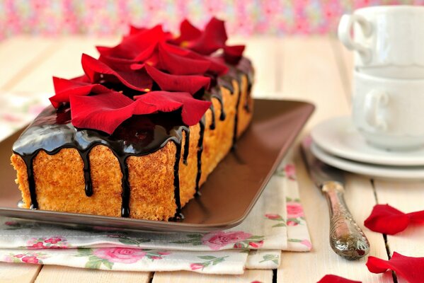 Chocolate cake with rose petals