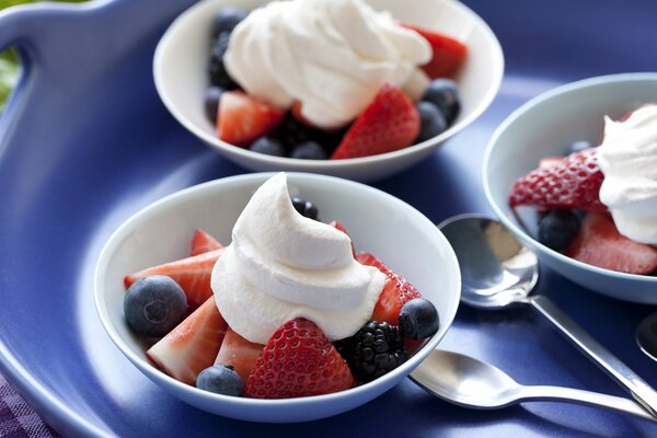 Strawberries and blackberries with cream