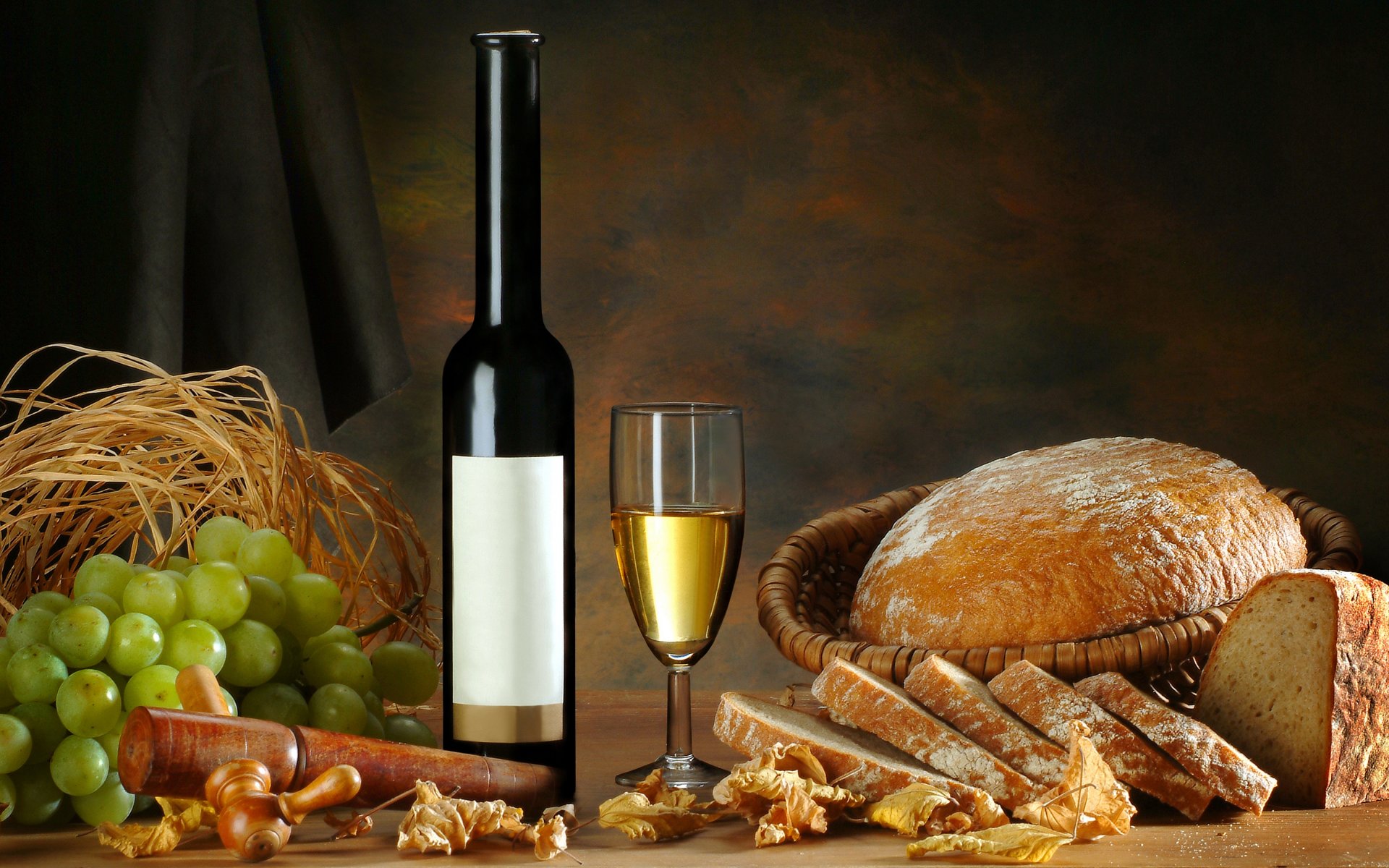 wine white glass a bottle bread grapes leave