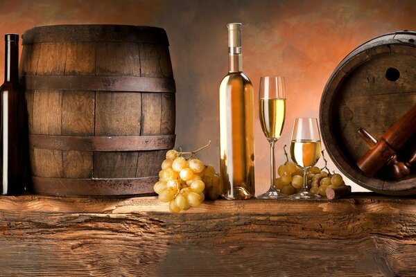 White wine in barrels and glasses