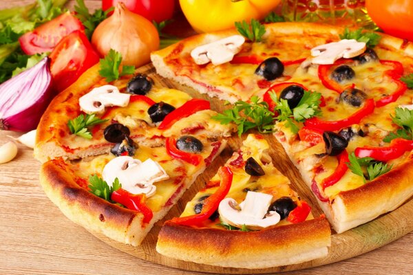 Pizza with olives and champignons