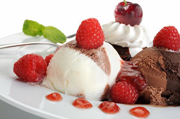 Ice cream with fresh berries and raspberries and cherries