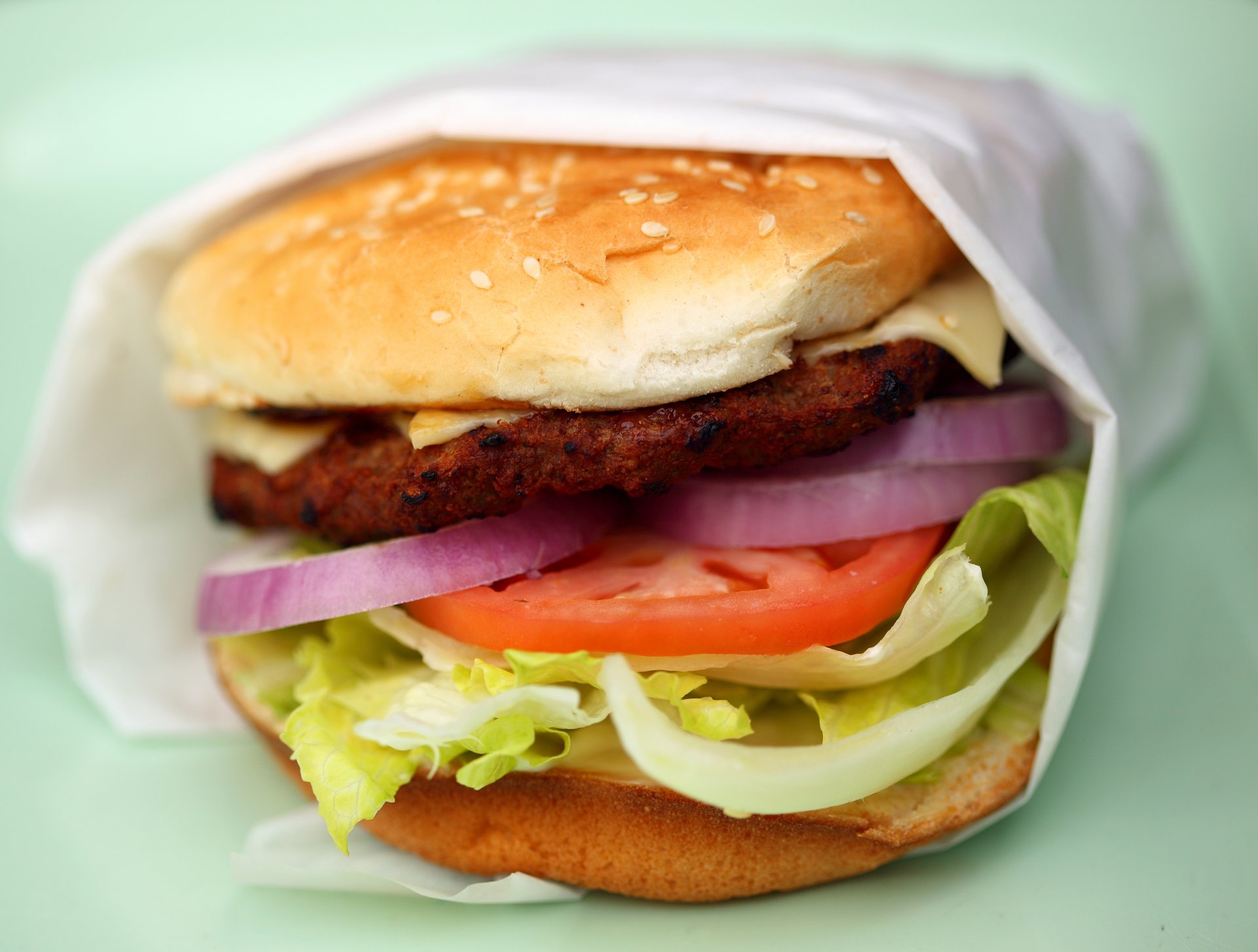 close up cheeseburger and tomato patty cheese torment cabbage roll yum