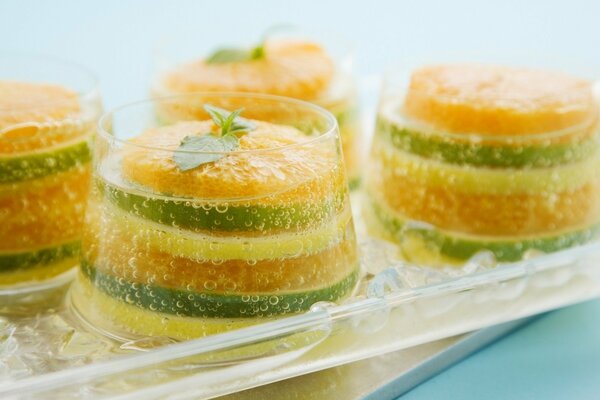 Beautiful fruit dessert with citrus fruits